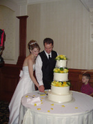 laurie and john cut the cake
