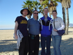 hugh, dad, orin and jenni on the beach