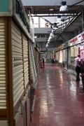 the mostly-closed stalls in mercado de la cebada